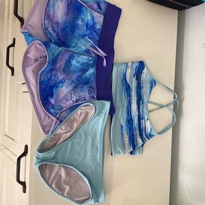 Three piece Ivivva reversible bikinis with swim shorts